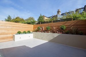 modern lush outdoor space, indoor outdoor living in london clapham house